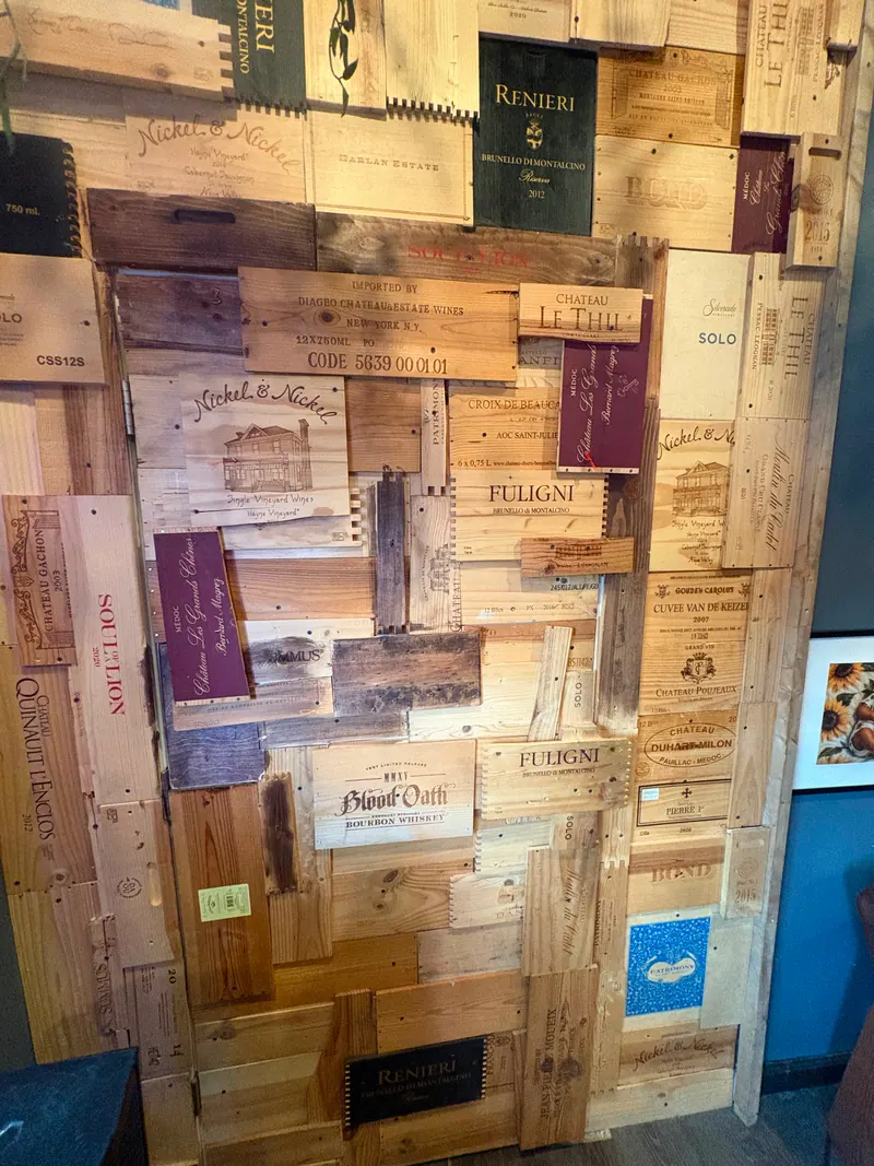 Wine-crate panels forming the speakeasy entrance