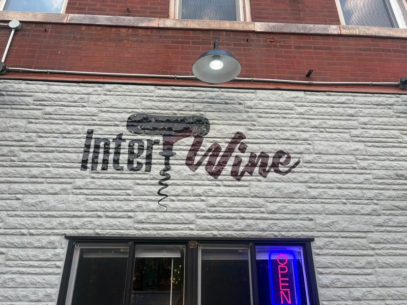 The Intertwine painted storefront sign
